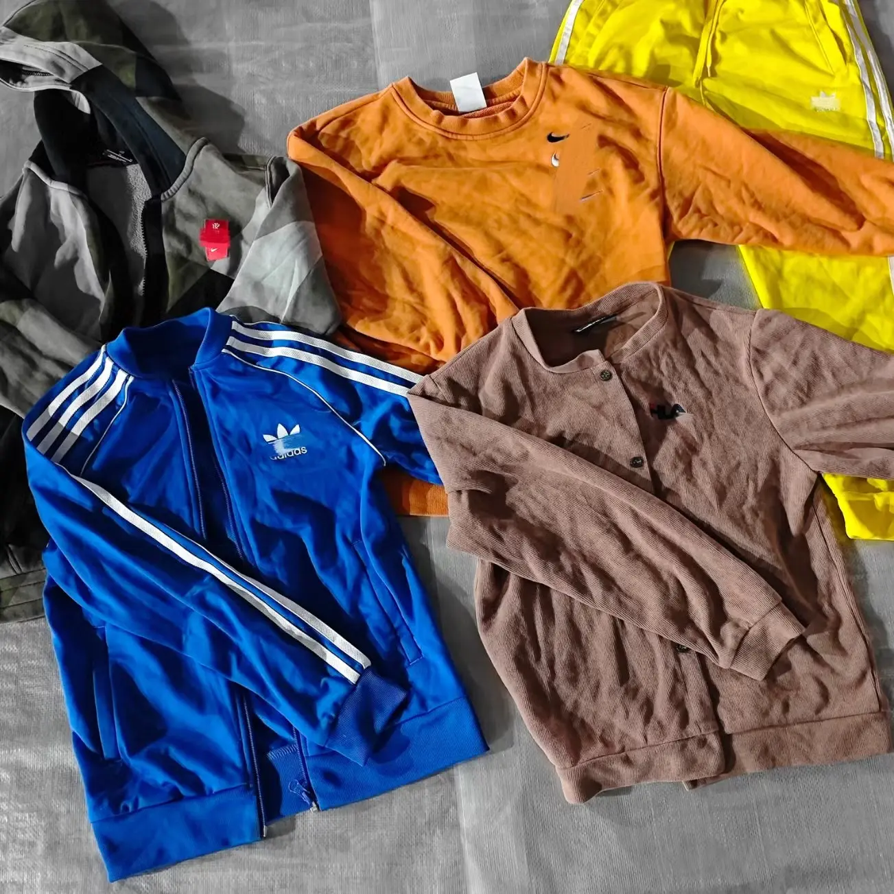 Vintage sports jackets and windbreakers freshly sorted for the shop